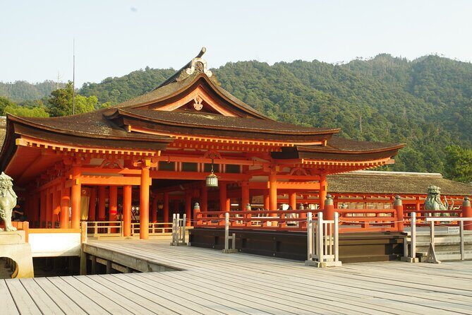Miyajima Exploring Highlights and Sunset Cruise - The sea perspective: sunset cruise style views of the red torii